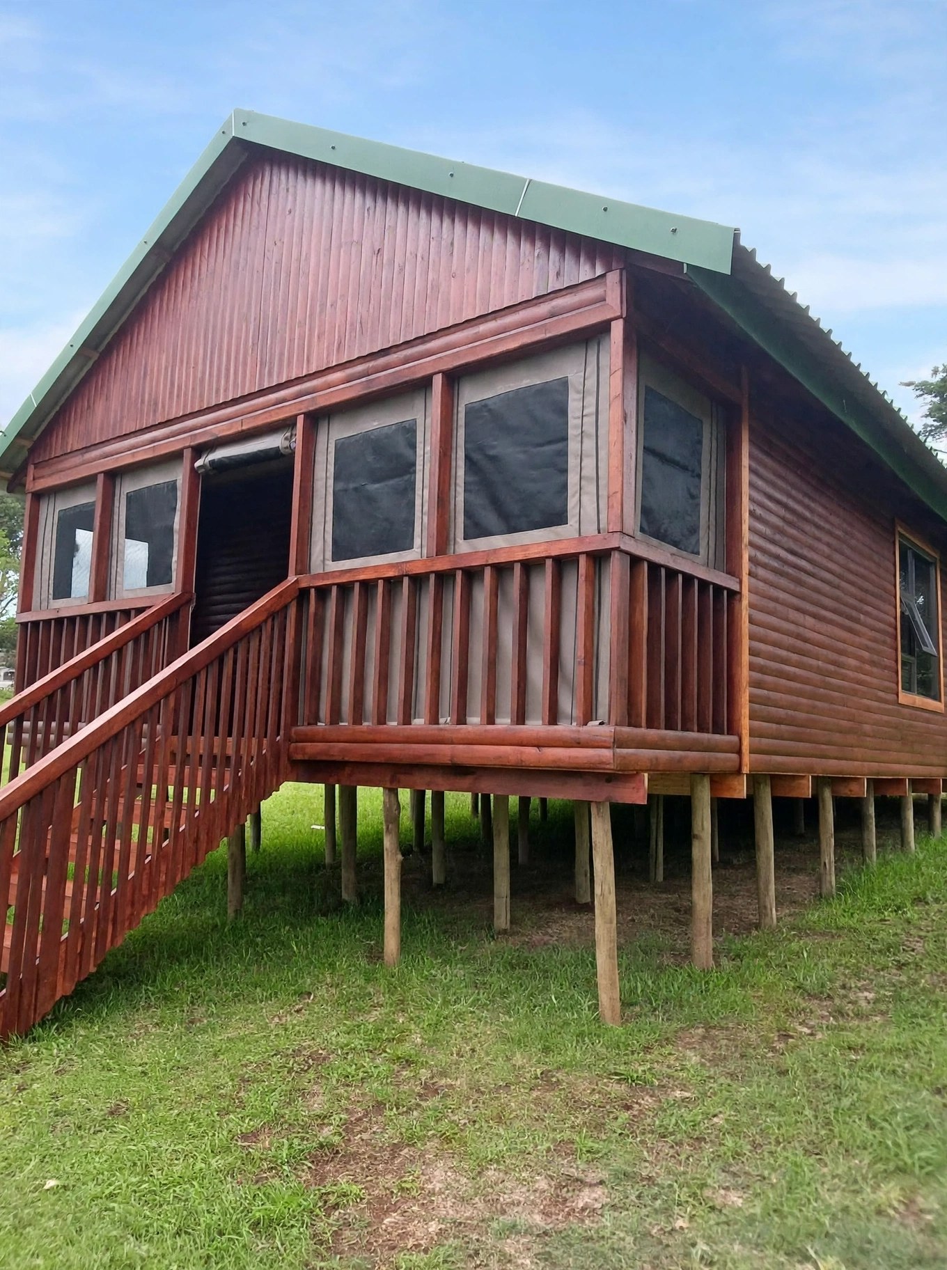 Raised timber cabin with front veranda