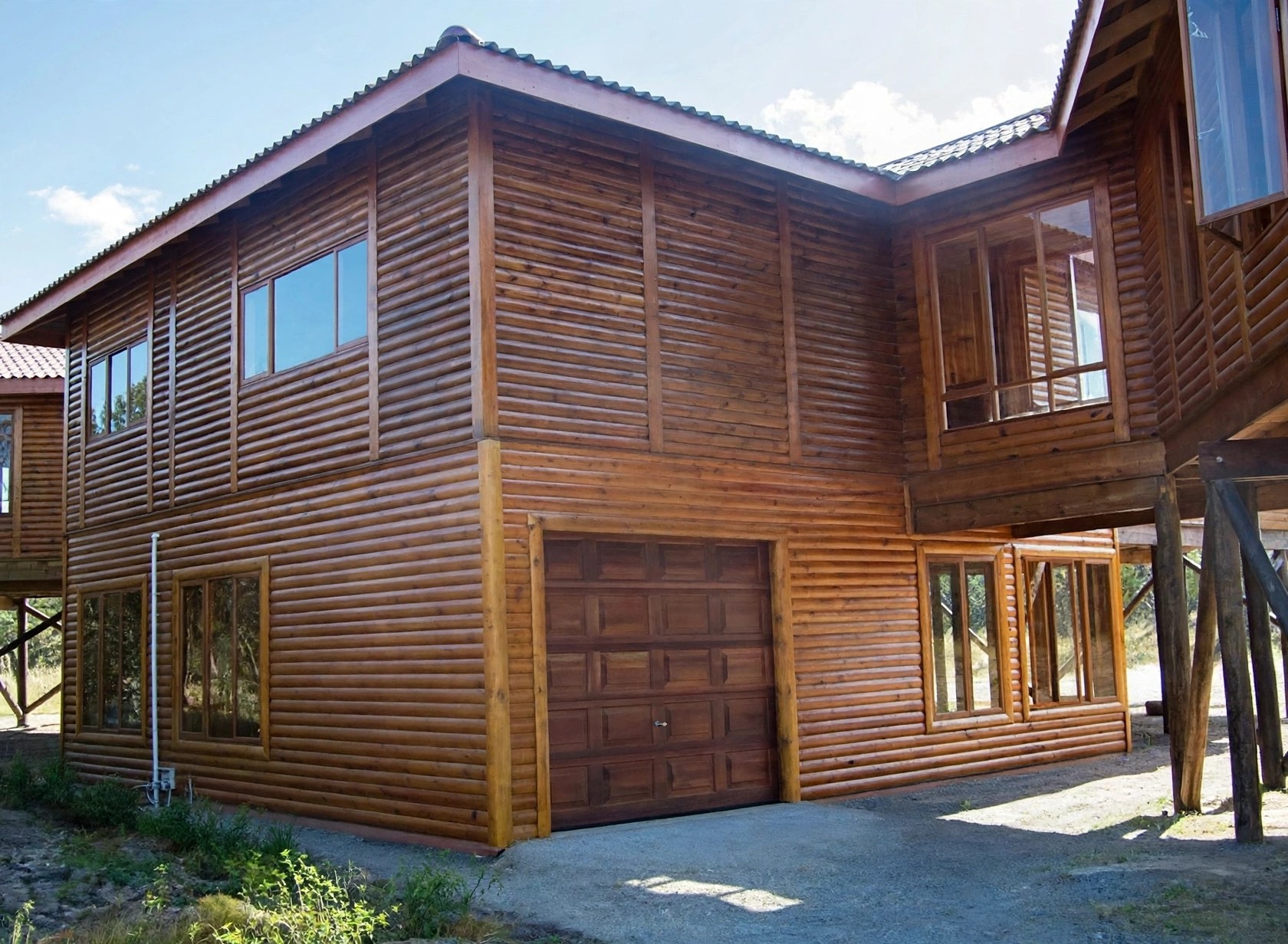 Two-storey timber home with large windows