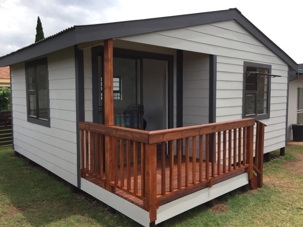 Grey Nutec home with a timber veranda in Sandton