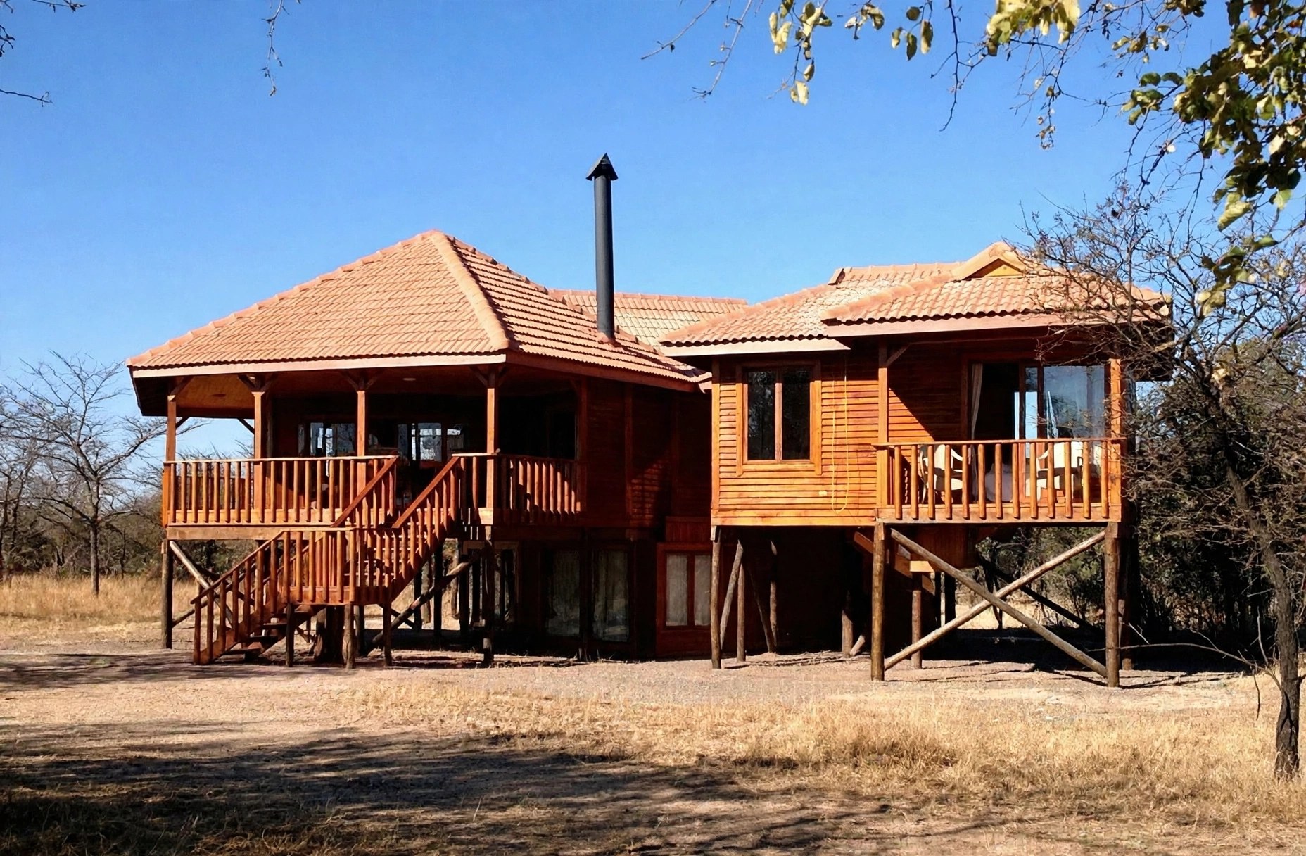 Timber home with two verandas and a tiled roof